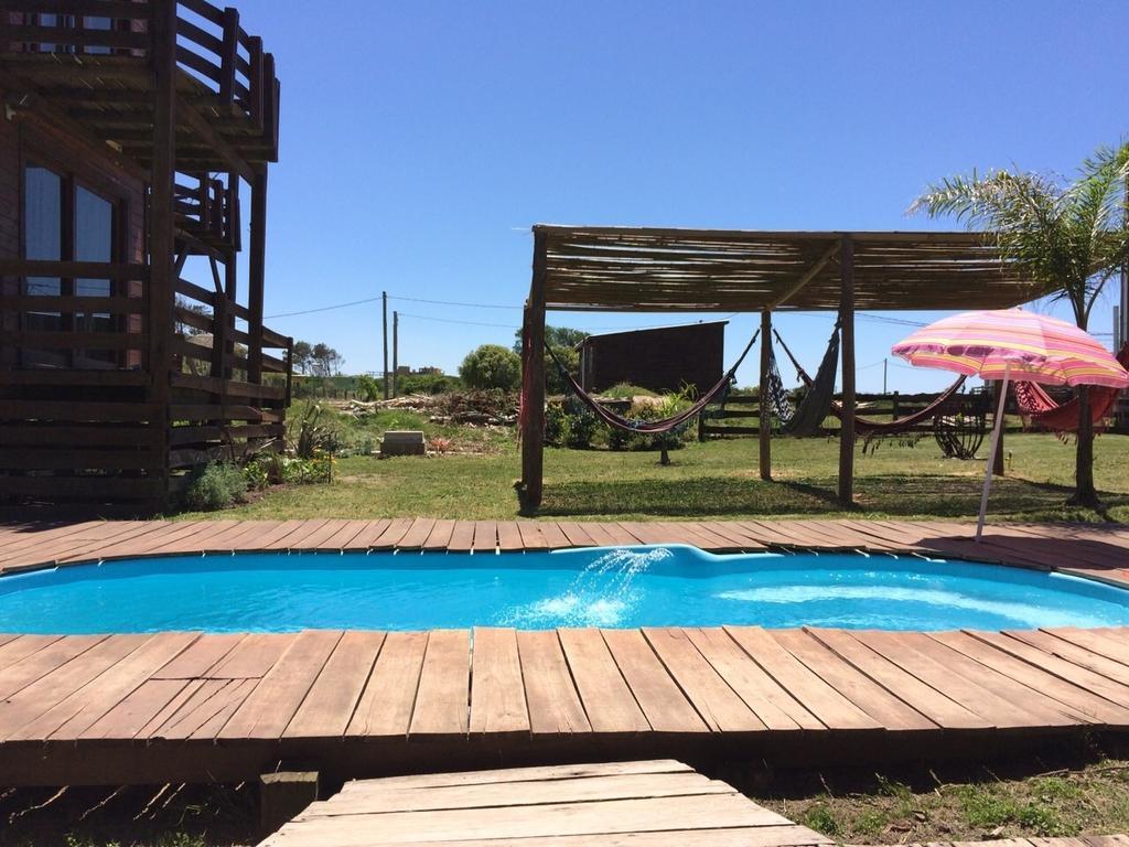 Cabanas La Paz Del Diablo Villa Punta Del Diablo Rom bilde